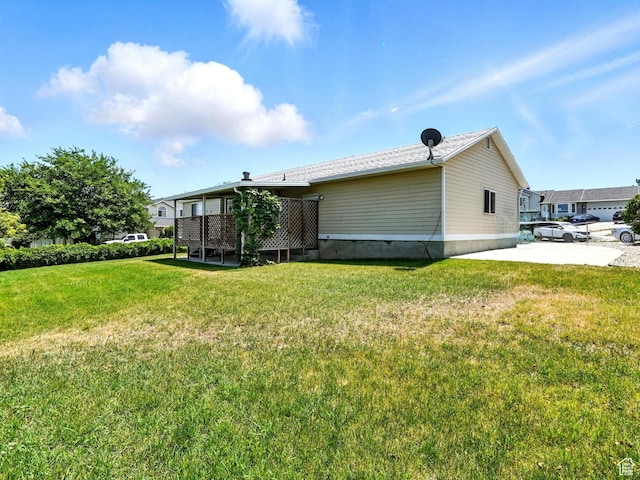 3992 S 4665 W, West Valley City, UT 84120 - view of side of home featuring a yard