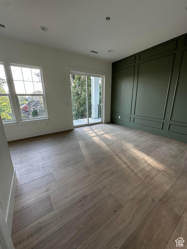 1361 S Lincoln St, Salt Lake City, UT 84105 - unfurnished room featuring wood finished floors and recessed lighting