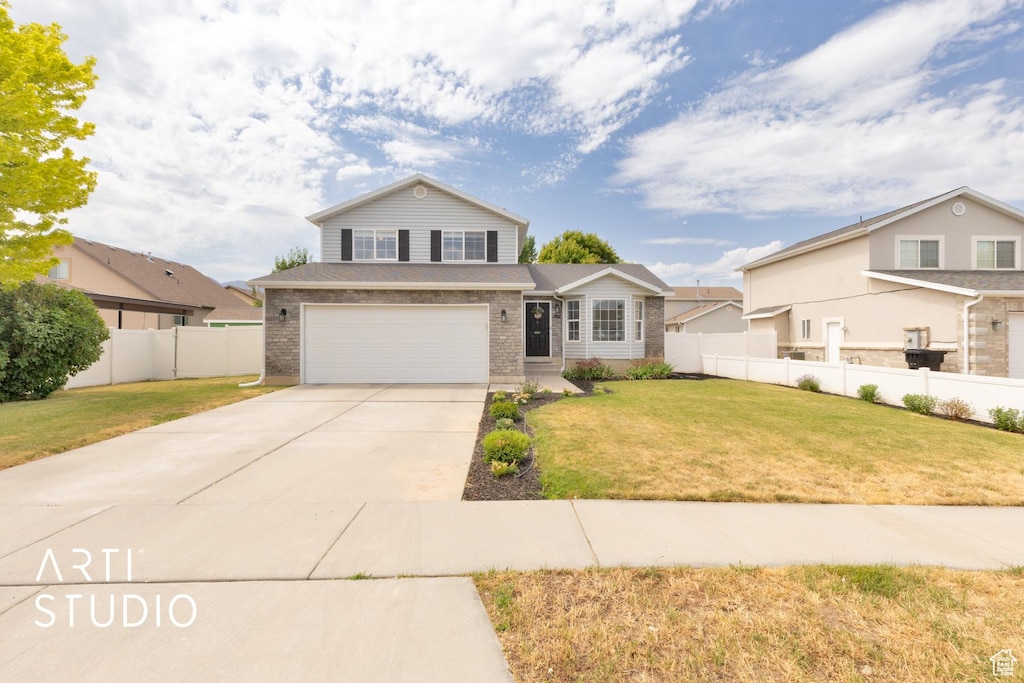 507 W 350 S, Spanish Fork, UT 84660 - view of front of home with brick siding, an attached garage, and driveway