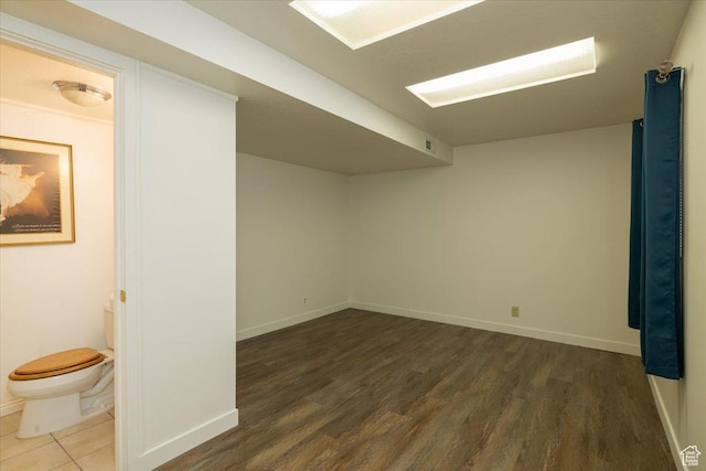 1141 E Murray Holladay Rd S, Millcreek, UT 84117 - finished below grade area with wood finished floors and baseboards