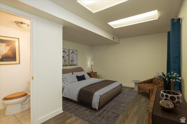 1141 E Murray Holladay Rd S, Millcreek, UT 84117 - bedroom featuring ensuite bathroom and wood finished floors