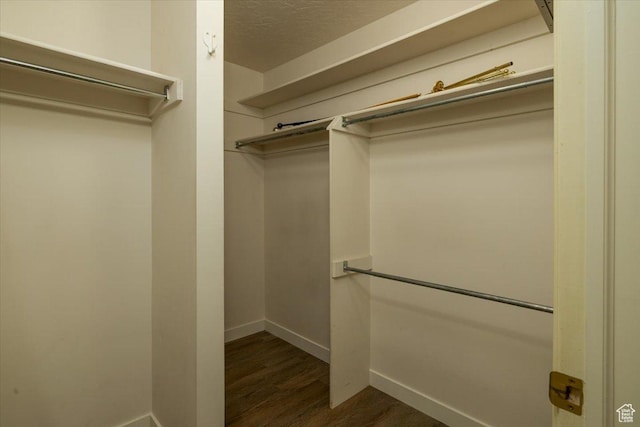1141 E Murray Holladay Rd S, Millcreek, UT 84117 - walk in closet featuring dark wood-type flooring