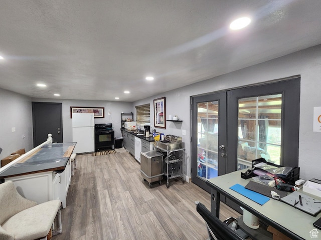 6319 W 13400 S, Herriman, UT 84096 - kitchen with white appliances, french doors, a desk, white cabinetry, and light wood-style flooring