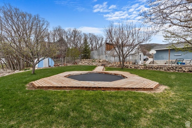 24725 N 11925 E, Fairview, UT 84629 - view of green lawn with a storage unit and a deck