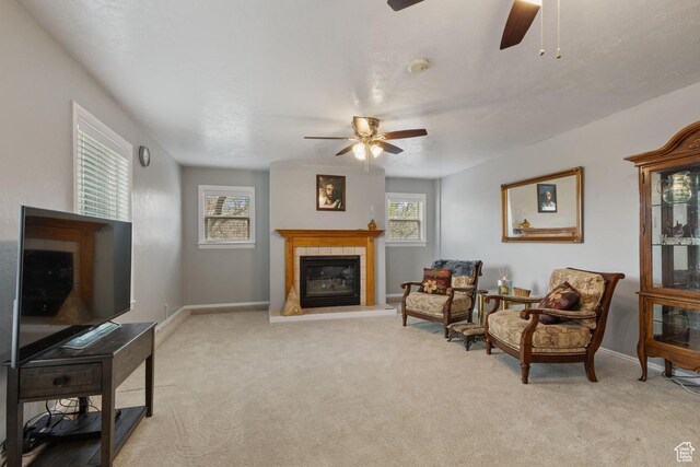 24725 N 11925 E, Fairview, UT 84629 - living room featuring a ceiling fan, a tile fireplace, and light colored carpet