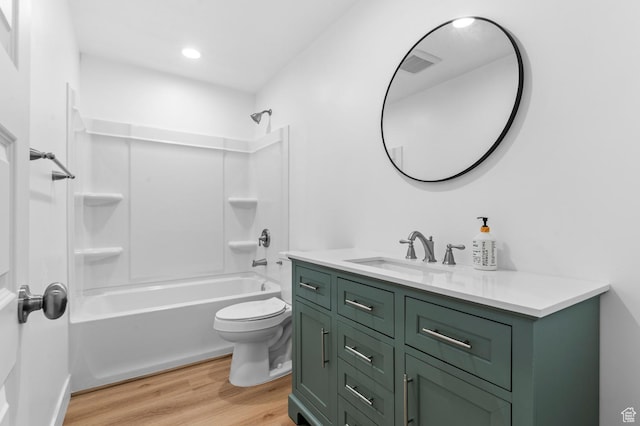13703 S Blayde Dr, Herriman, UT 84096 - bathroom with wood finished floors, vanity, bathtub / shower combination, and recessed lighting