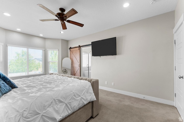 13703 S Blayde Dr, Herriman, UT 84096 - bedroom with carpet flooring, a barn door, recessed lighting, and a ceiling fan