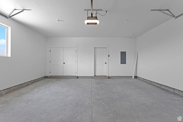 496 S 30 E, Franklin, ID 83237 - garage featuring electric panel and a garage door opener