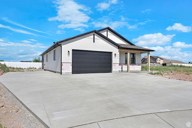 496 S 30 E, Franklin, ID 83237 - view of front of property with a garage, a porch, and driveway