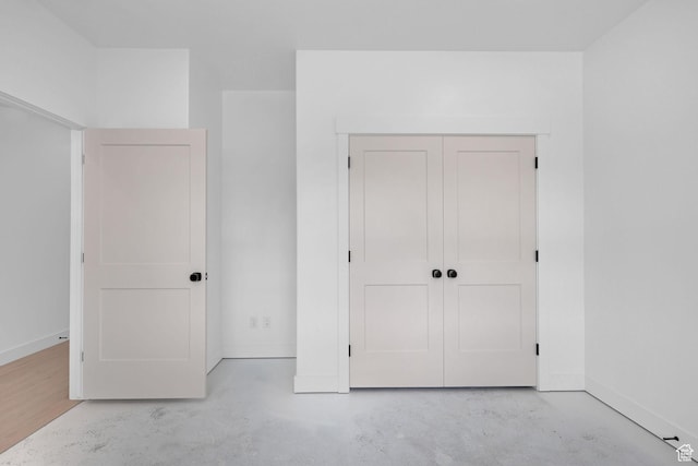 496 S 30 E, Franklin, ID 83237 - unfurnished bedroom with concrete floors and a closet