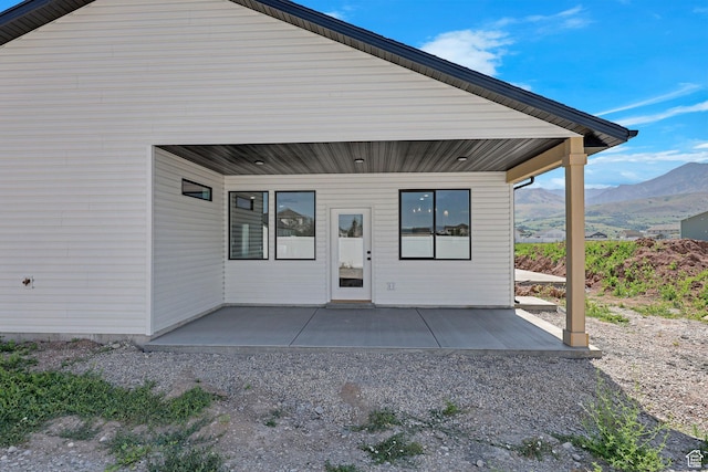 496 S 30 E, Franklin, ID 83237 - back of house with a mountain view and a patio area