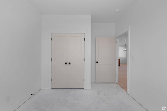 496 S 30 E, Franklin, ID 83237 - unfurnished bedroom with finished concrete floors and a closet