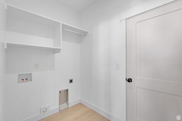 496 S 30 E, Franklin, ID 83237 - washroom with hookup for an electric dryer, hookup for a washing machine, and light wood finished floors