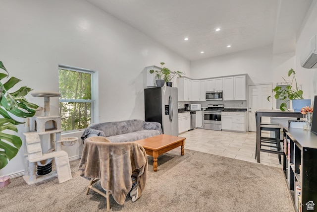 3981 S 500 E, Millcreek, UT 84107 - living room with a high ceiling, recessed lighting, and light tile patterned flooring