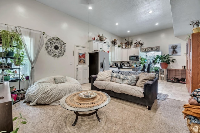 3981 S 500 E, Millcreek, UT 84107 - living room featuring recessed lighting, a textured ceiling, and a high ceiling