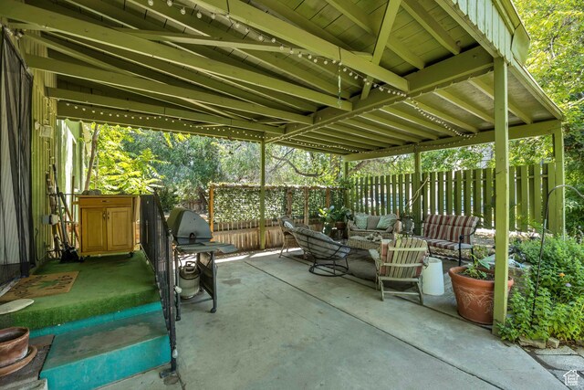 3981 S 500 E, Millcreek, UT 84107 - fenced backyard featuring an outdoor hangout area, a patio, and a grill