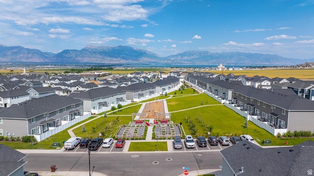 4925 E Breezy Patch Rd, Eagle Mountain, UT 84005 - aerial perspective of suburban area featuring a mountainous background