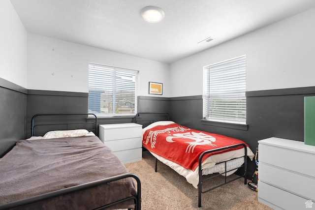 4925 E Breezy Patch Rd, Eagle Mountain, UT 84005 - bedroom with a wainscoted wall and carpet flooring