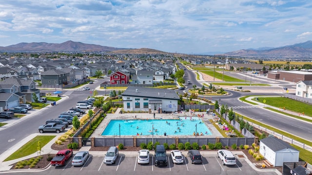 4925 E Breezy Patch Rd, Eagle Mountain, UT 84005 - aerial view of residential area with a mountainous background