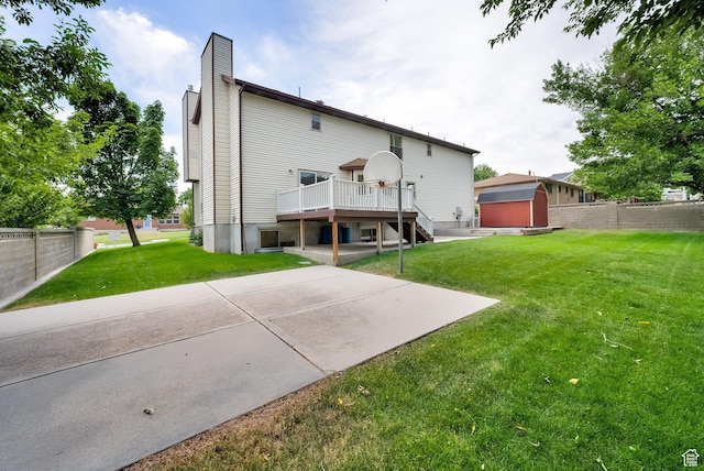 1604 W Roenewood Cir S, Taylorsville, UT 84123 - back of property featuring a shed, a wooden deck, a chimney, a patio area, and stairs