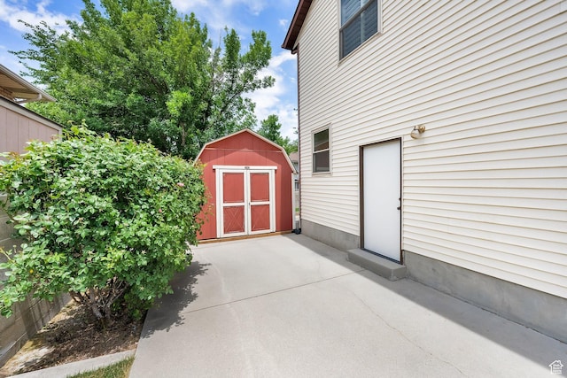 1604 W Roenewood Cir S, Taylorsville, UT 84123 - view of patio / terrace featuring a shed