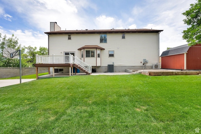1604 W Roenewood Cir S, Taylorsville, UT 84123 - back of house featuring a deck, stairway, a chimney, a storage unit, and a patio