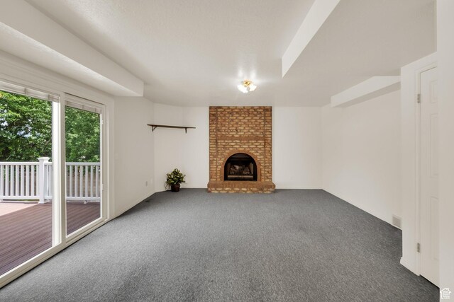 1604 W Roenewood Cir S, Taylorsville, UT 84123 - unfurnished living room featuring carpet and a fireplace