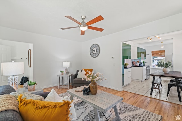 722 E 50 S, Provo, UT 84606 - living room featuring a ceiling fan and light wood-type flooring