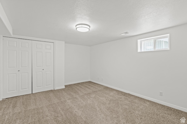 722 E 50 S, Provo, UT 84606 - unfurnished bedroom featuring carpet flooring, a textured ceiling, and a closet