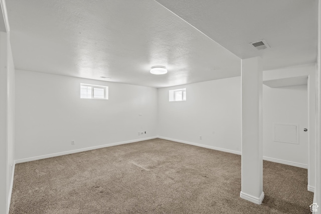 722 E 50 S, Provo, UT 84606 - below grade area featuring carpet floors, healthy amount of natural light, and a textured ceiling