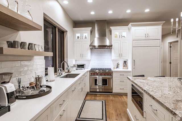 6423 Golden Bear Loop Unit 5, Park City, UT 84098 - kitchen with wall chimney exhaust hood, appliances with stainless steel finishes, recessed lighting, open shelves, and white cabinets