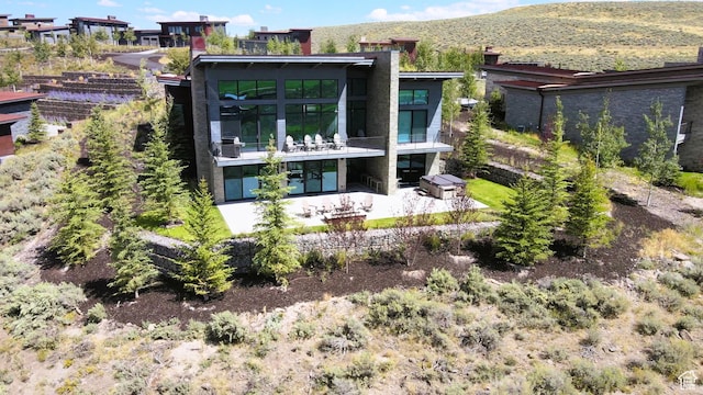 6423 Golden Bear Loop Unit 5, Park City, UT 84098 - rear view of house with a patio area and a mountain view