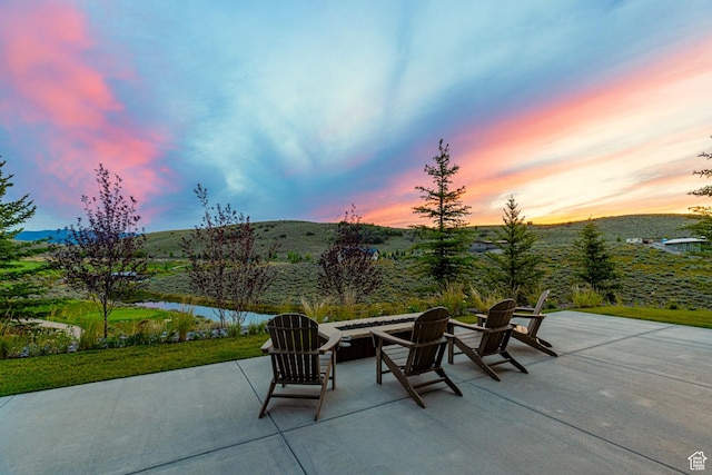6423 Golden Bear Loop Unit 5, Park City, UT 84098 - view of patio / terrace with a water view and an outdoor fire pit