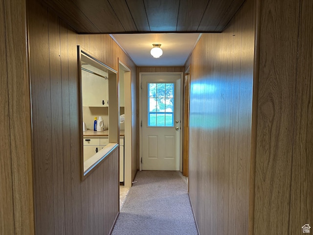 487 Highland Blvd, Brigham City, UT 84302 - doorway to outside featuring wooden walls and light carpet