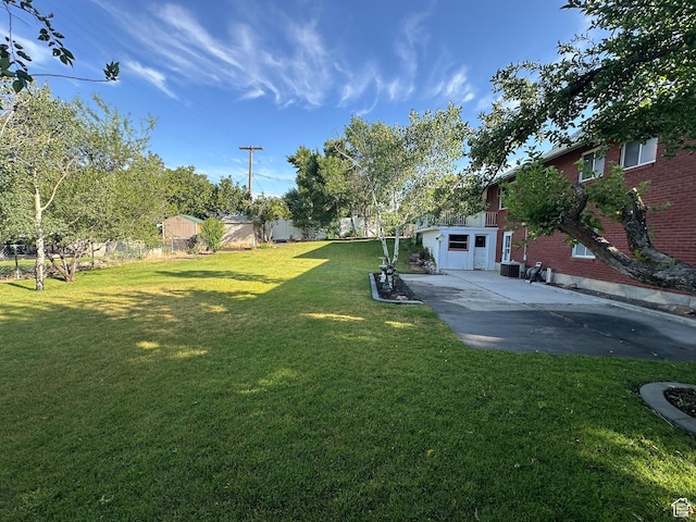 487 Highland Blvd, Brigham City, UT 84302 - view of grassy yard with a patio