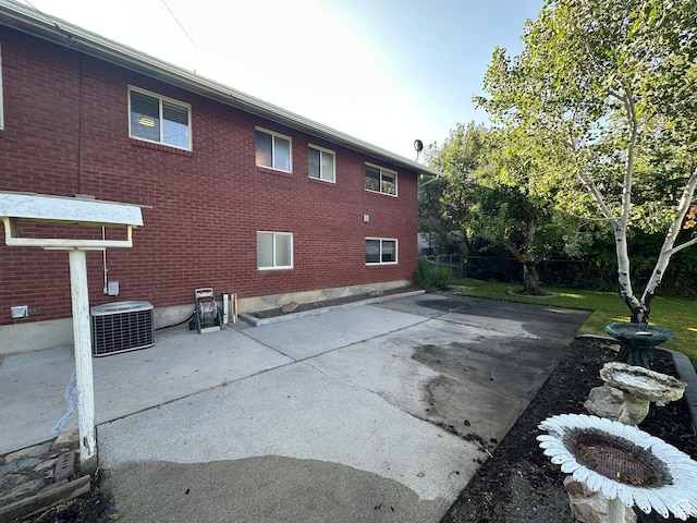 487 Highland Blvd, Brigham City, UT 84302 - back of property with a patio area and brick siding