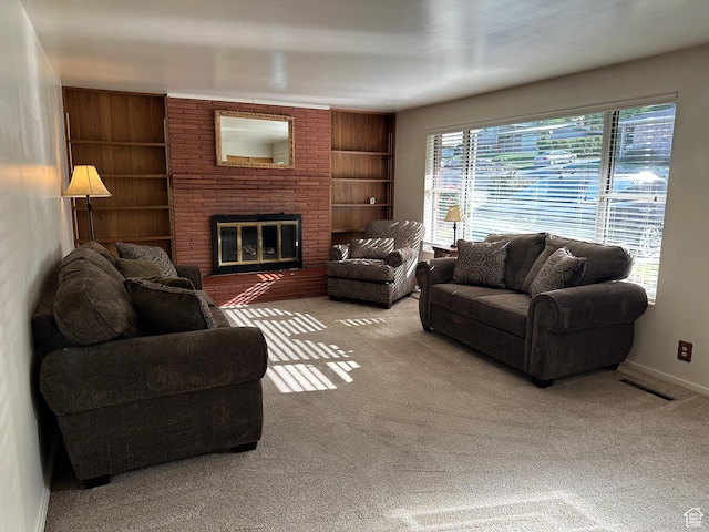 487 Highland Blvd, Brigham City, UT 84302 - carpeted living room with built in shelves and a brick fireplace