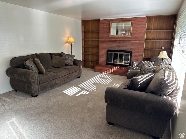 487 Highland Blvd, Brigham City, UT 84302 - living room featuring built in shelves, a fireplace, and carpet floors