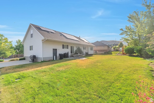 314 E 1290 S, Payson, UT 84651 - rear view of house with a patio, a playground, solar panels, and a shingled roof