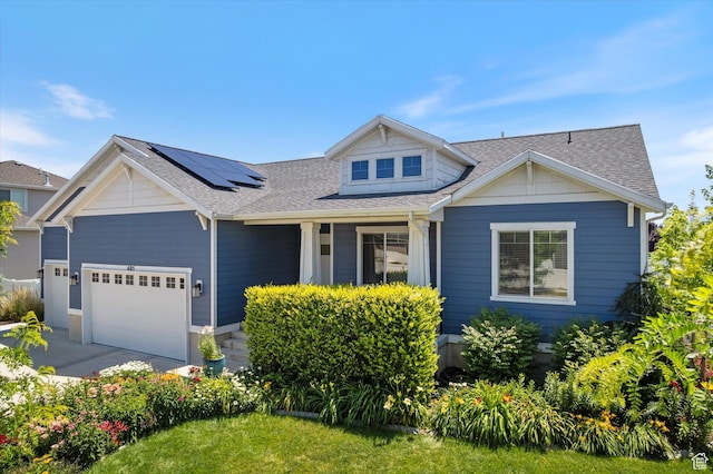 605 W 1660 S, Provo, UT 84601 - view of front facade featuring a garage, solar panels, and roof with shingles