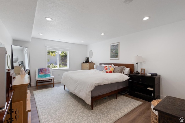 605 W 1660 S, Provo, UT 84601 - bedroom with wood finished floors, recessed lighting, and a textured ceiling