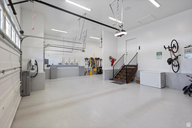 605 W 1660 S, Provo, UT 84601 - garage with a garage door opener and fridge