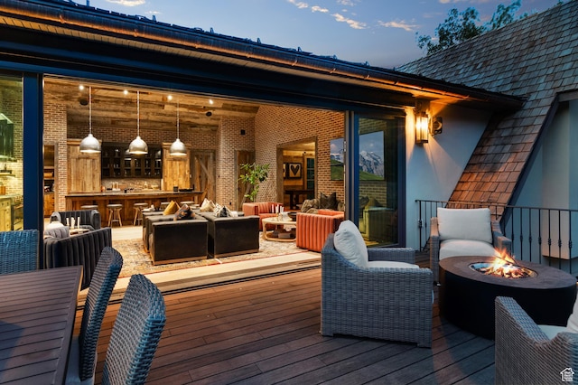 5155 E Canyon Rd, Morgan, UT 84050 - deck with an outdoor living space with a fire pit