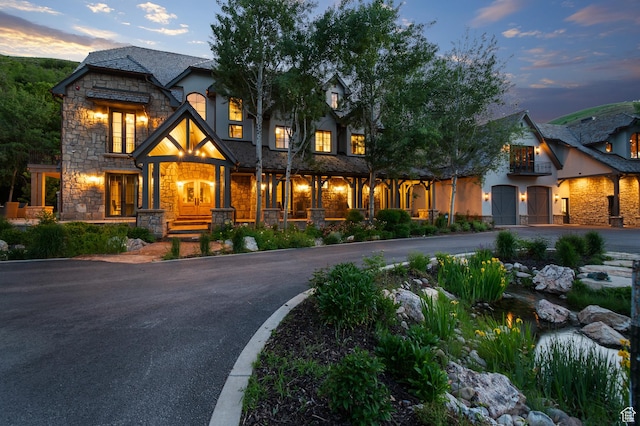 5155 E Canyon Rd, Morgan, UT 84050 - view of front of property featuring stone siding and curved driveway
