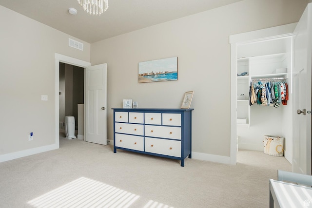 1017 S 2740 E, Spanish Fork, UT 84660 - bedroom with carpet floors, a walk in closet, and a chandelier