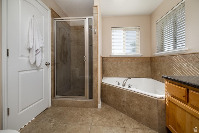 4145 W 700 N, Vernal, UT 84078 - full bathroom with a garden tub, a stall shower, and vanity