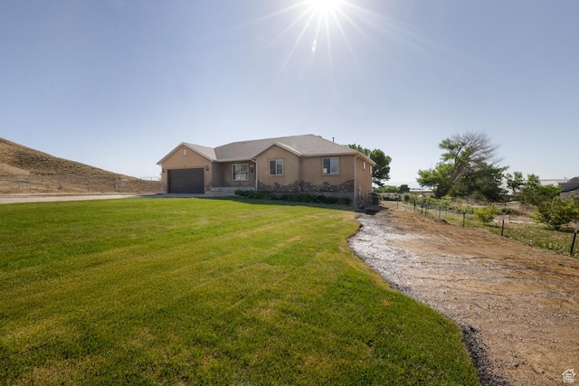 4145 W 700 N, Vernal, UT 84078 - single story home with an attached garage, stucco siding, and asphalt driveway