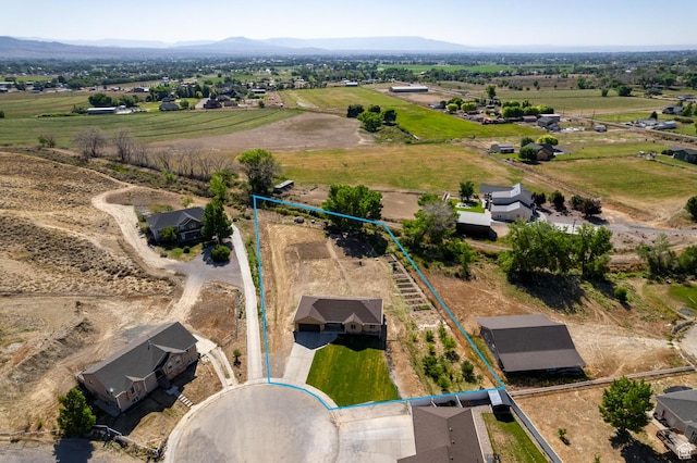 4145 W 700 N, Vernal, UT 84078 - overview of rural landscape with property parcel outlined and a mountain backdrop