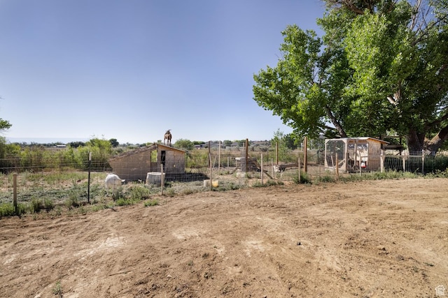 4145 W 700 N, Vernal, UT 84078 - view of yard featuring an outdoor structure and a view of rural / pastoral area
