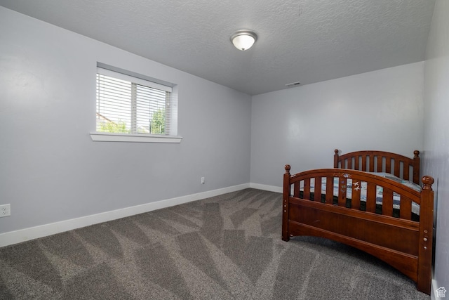 4145 W 700 N, Vernal, UT 84078 - carpeted bedroom featuring a textured ceiling and baseboards